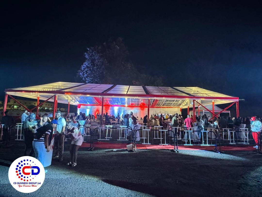 Transparent marquee glowing red and blue at night for Friends of Amstel at BK Arena